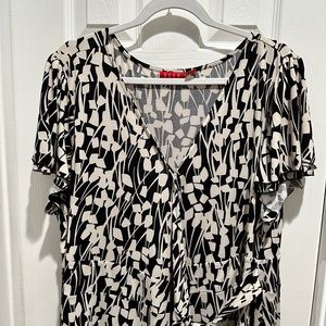 Black and cream colored dress